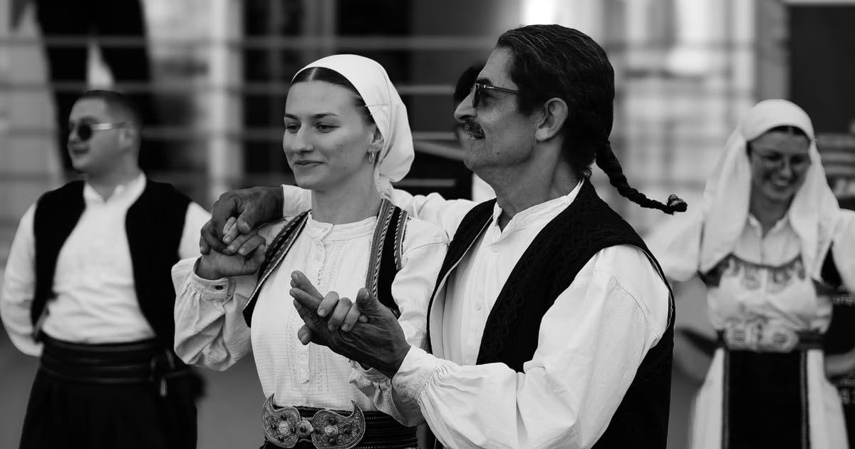 A group performing traditional dance in Sarajevo, showcasing cultural heritage.
