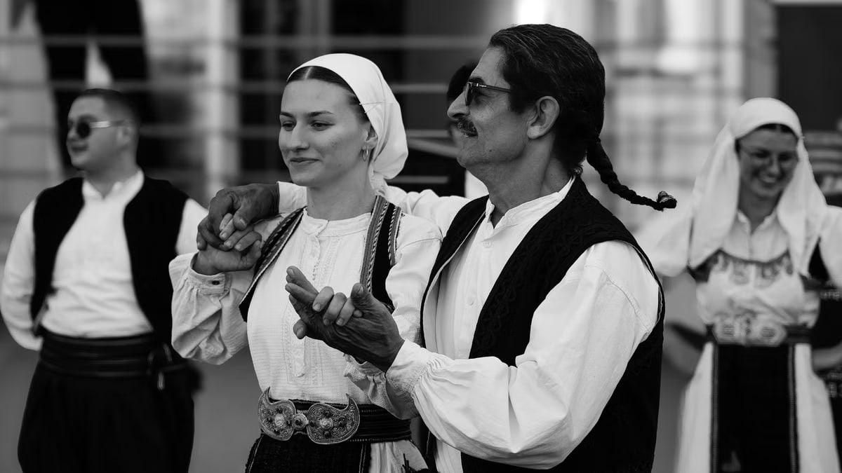 A group performing traditional dance in Sarajevo, showcasing cultural heritage.